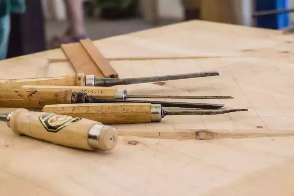 Woodworking hobby tools on a wooden table.