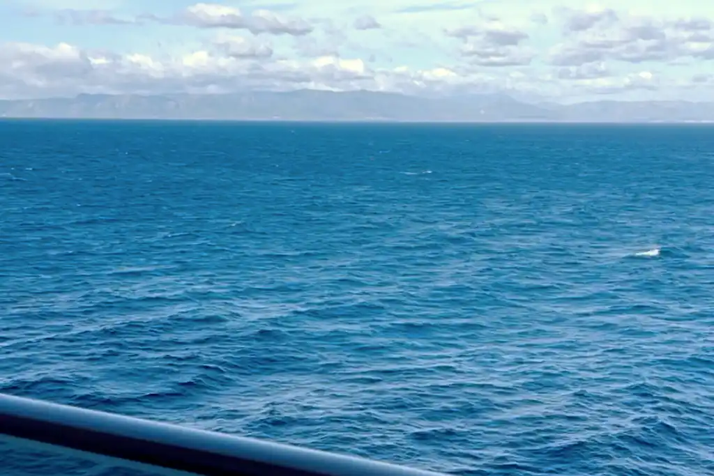 A beautiful, calm sea and sky pictured from the balcony of MSC Bellissima cruise ship's cabin.