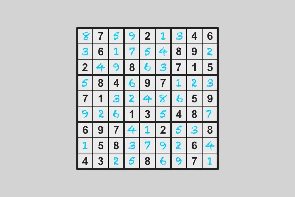 Numbers written on the grid of a finished Sudoku puzzle game. 