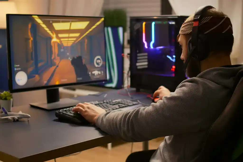 A photograph of a professional gamer practicing reaction time on a FPS game. 