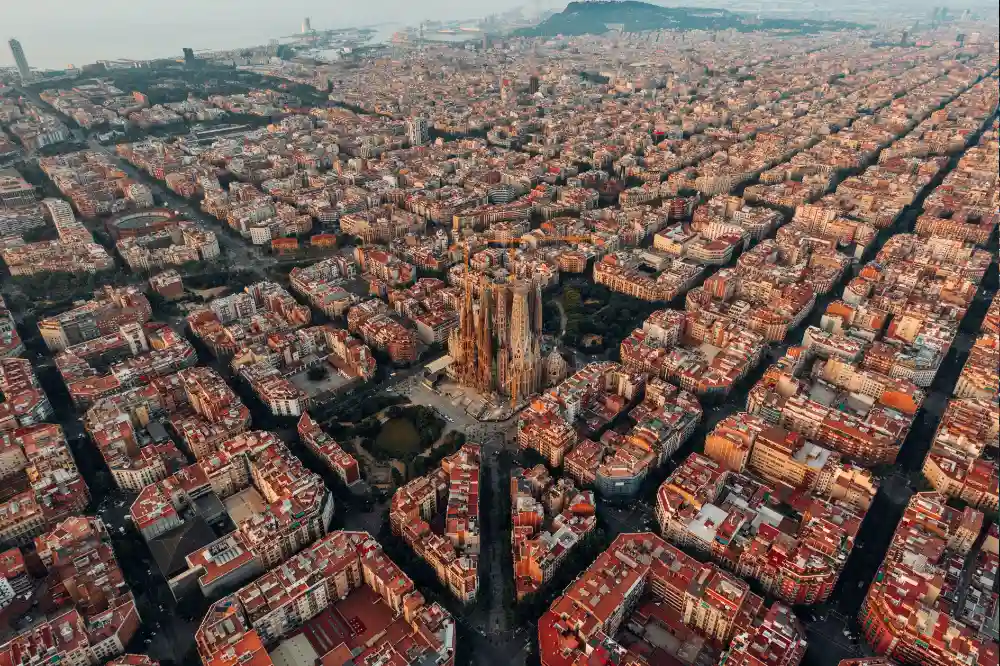 An aerial image of a beautiful city of Barcelona, one of the best places to travel with friends for a weekend.