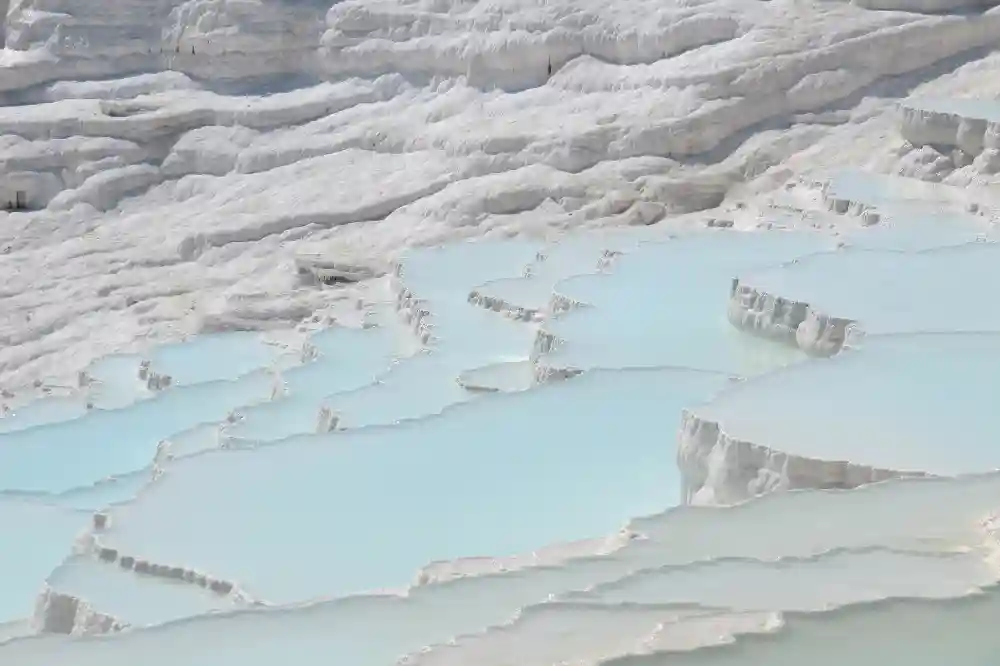 Pamukkale in Turkey, a natural mineral resource, and one of the best places to travel with friends.